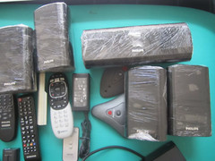 Mixed Lot of Electronics speakers, remote controls, batteries, and more W