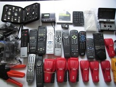 Mixed Lot of Electronics, remotes, Stud finder and more. S