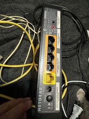 Electronics Junk Lot 2 Modems, Broken Flash Light, Cords, Broken Metal Detector