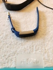 Lot Of 2 Fitbit Watches + Bands + Charging Cables + Boxes Need New Battery