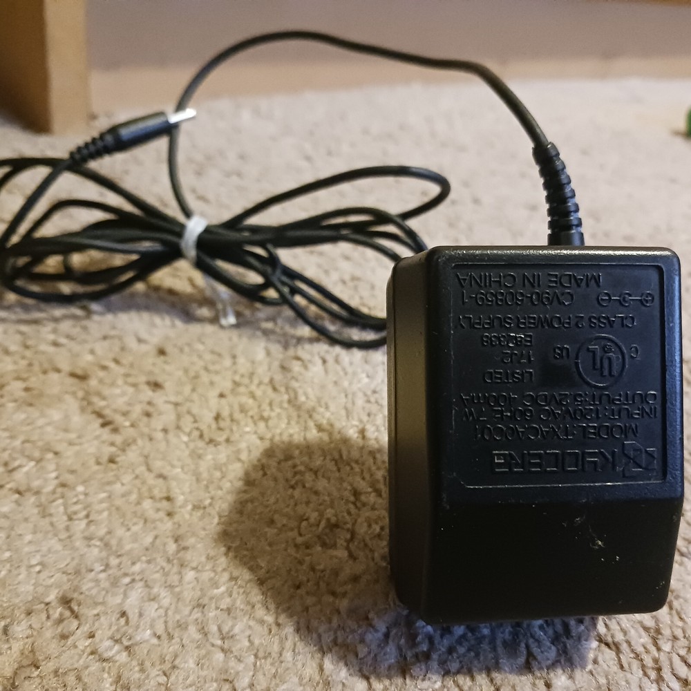 Kyocera black plug 120v ac 60 hertz medium size block 90s 2000s used
